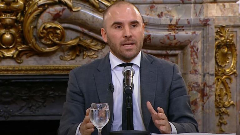 Martin Guzmán y Alberto Fernandez anuncios para adaptar 20220418