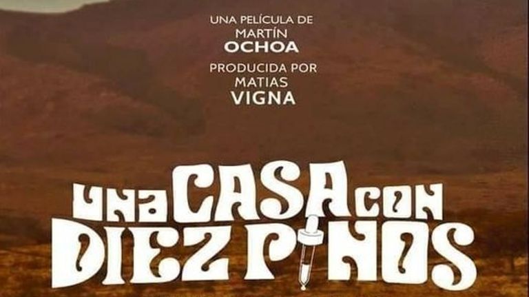 Una casa con diez pinos