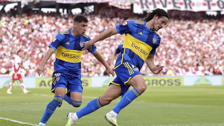 Miguel Merentiel y Edinson Cavani