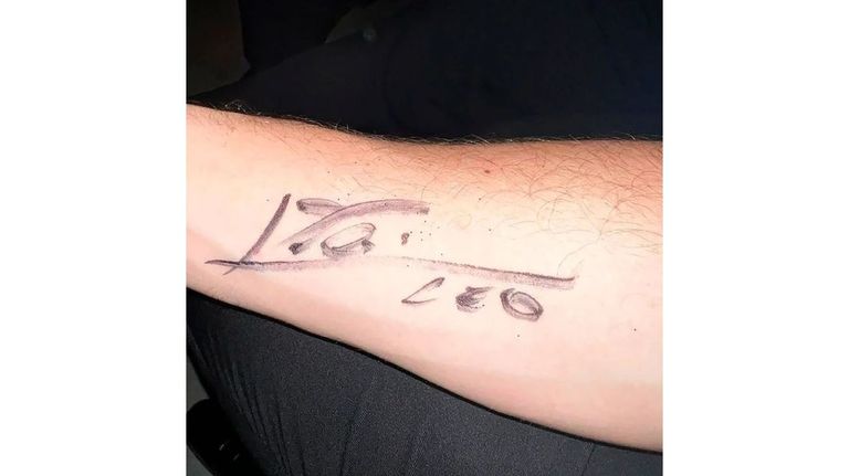Autógrafo de Lionel Messi 20221228