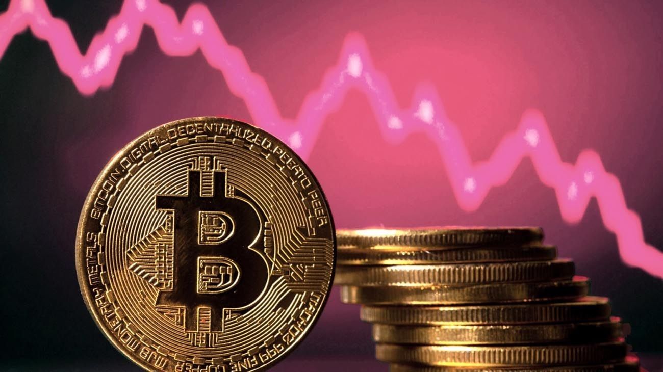 Caída de las criptomonedas a la espera de la decisión de la Fed: ¿Qué factores influyen en este descenso por debajo de los 58,000 dólares?