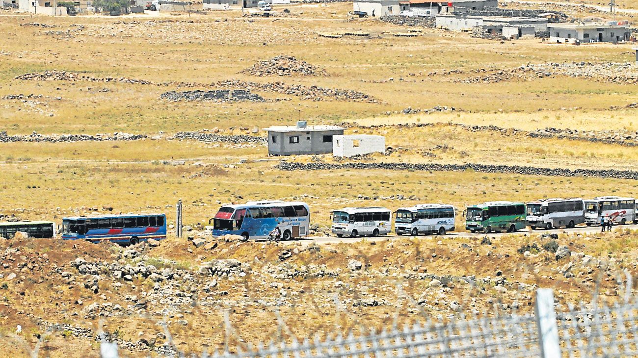 Rebeldes abandonan el Golán tras un acuerdo con Al-Assad