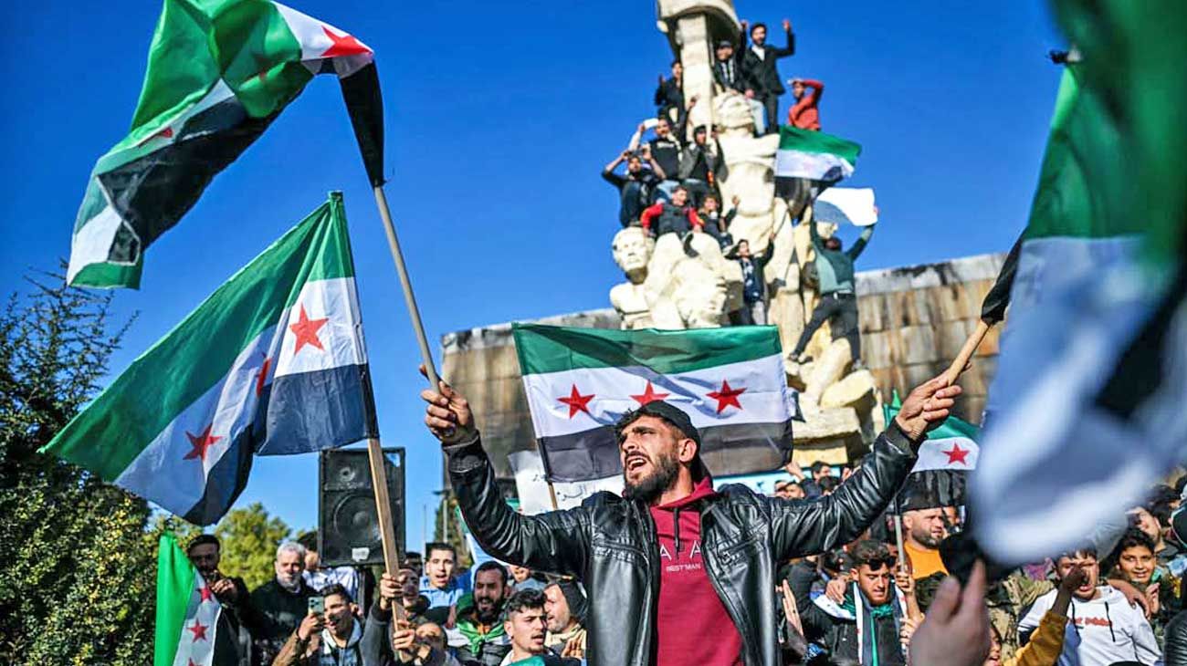 Los sirios festejan en las calles de Damasco “la victoria de la revolución”